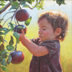 Little girl picking an apple